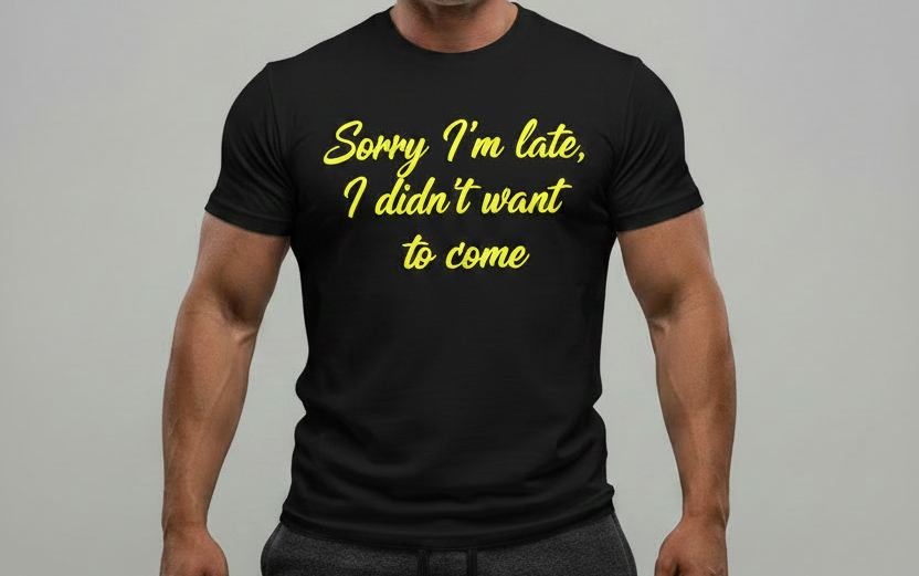 Black t-shirt with yellow font - relaxed bodybuilder pose